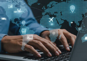 Global trade management system software with world map showing international logistics and supply chain tracking technology